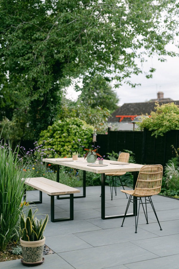 Garden dining table and matching bench on black square box section legs